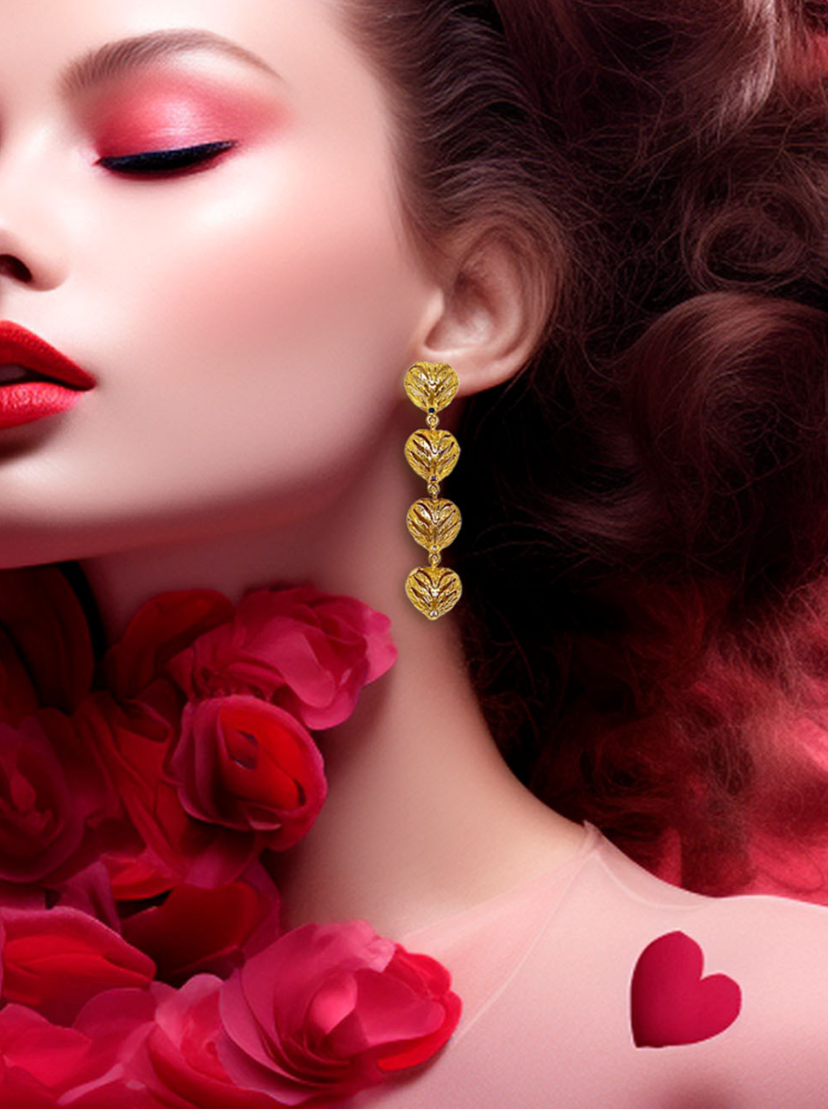 Long golden heart earrings