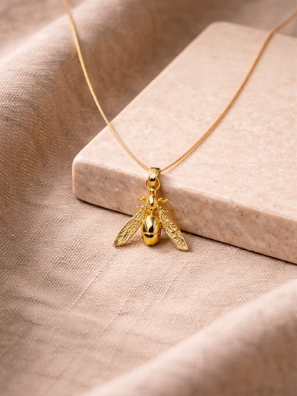Golden ant pendant necklace